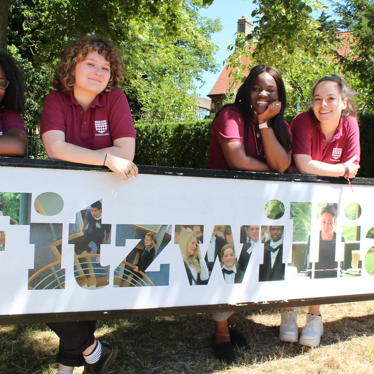 students with fitz logo
