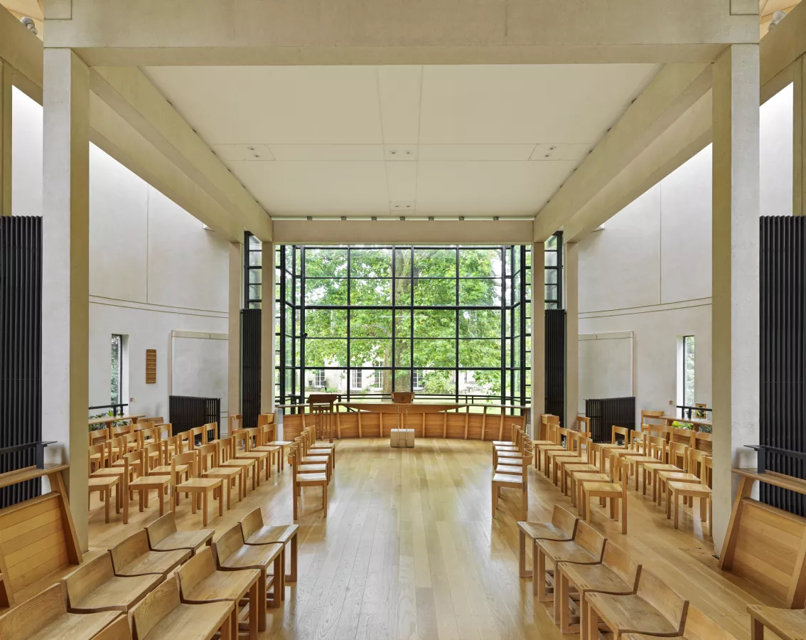 Newly listed at Grade II: Fitzwilliam College Chapel  Fitzwilliam College, Storeys Way, Cambridge, Cambridgeshire.  General view of chapel showing concrete frame by MacCormac, Jamieson, Pritchard, (MJP Architects), 1991. View from north west. © Historic England Archive